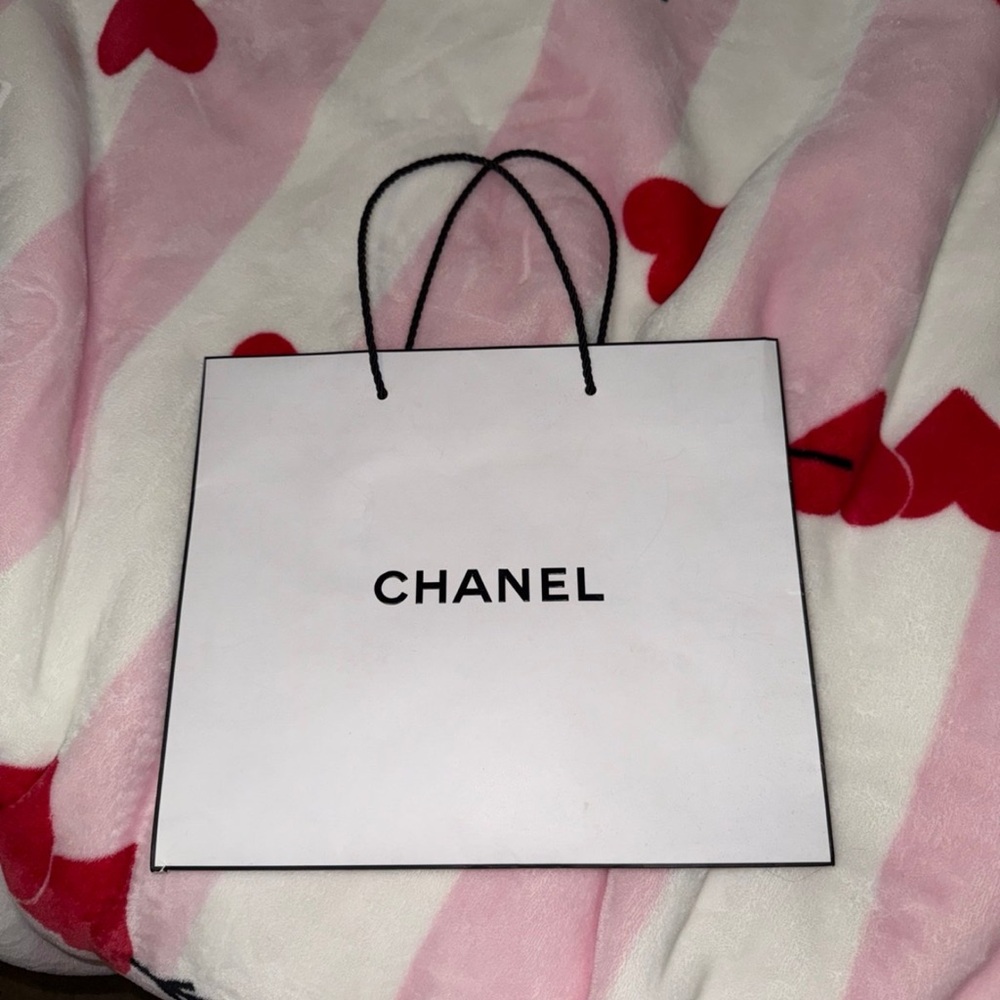 Chanel White Bag with Iconic Logo and Black Accents